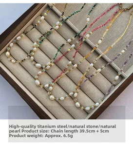 Detail of colorful natural stone and pearl necklaces with titanium steel adjustment chain