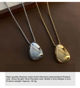 Polished titanium steel teardrop pendant showing 70cm chain and 2.5x3.2cm dimensions