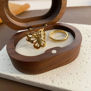 Minimalist 18k gold plated butterfly cutout ring and plain band set in jewelry box