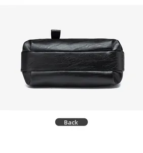 Detailed back view of a black PU leather crossbody bag showing stitching and texture