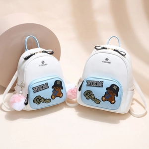 Cute mini PU leather backpack with bear embroidery and fluffy ball charms for girls
