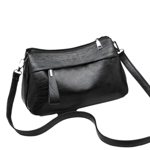 Elegant black pleated faux leather shoulder bag with silver zipper for stylish women