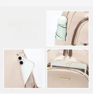 Vue détaillée du rangement multi-poches dans le sac à dos léger en tissu Oxford