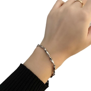 Minimalist Mobius titanium steel bracelet with twisted texture for men and women