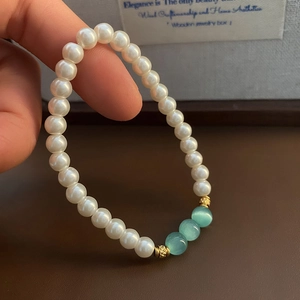 Beaded Bracelet With White Glass Artificial Pearls And Green Translucent Beads Gold Stainless Steel Spacers Vintage Elegant For Women