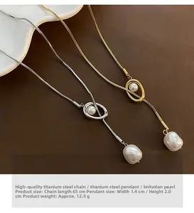 Detail of stainless steel pearl pendant necklace in gold and silver finish options