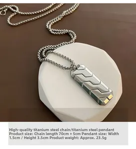 Detail of silver titanium steel necklace with 3.5cm geometric pendant and 75cm chain