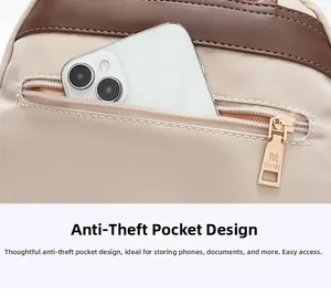 Detail of backpack back showing a hidden anti-theft zipper pocket for smartphone and IDs