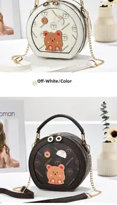 Detail of round crossbody bag with cute bear patch and premium metallic chain strap