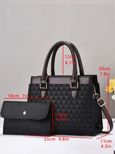Chic black geometric embossed faux leather handbag and wallet set with gold hardware