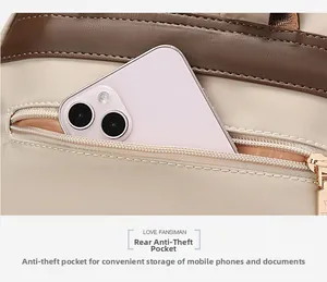 Close-up of the rear anti-theft zipper pocket on a nylon backpack for secure storage