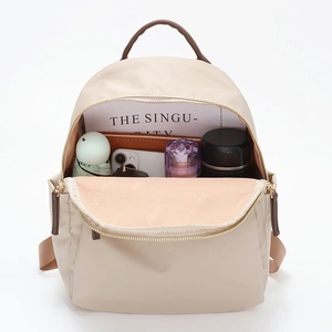 Beige oxford fabric backpack with large capacity storage for travel and school use