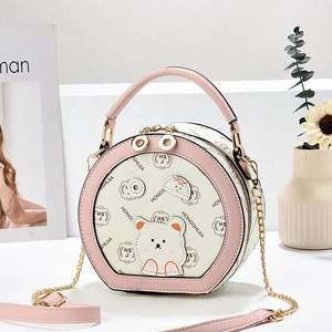 Pink and cream round crossbody bag with cute 3D bear and gold chain strap detailing