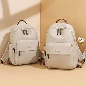 Classic beige oxford fabric backpack with leather details for stylish women travel
