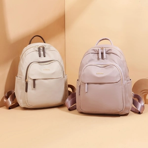 Sacs à dos en tissu Oxford pour femmes en crème et rose poudré sacs de voyage chic