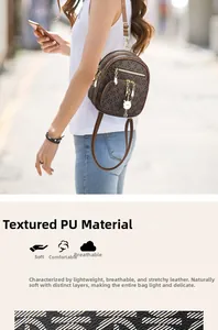 Macro detail of PU leather surface on a vintage printed shoulder bag with metal zipper