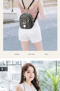 Detail of vintage pattern backpack with gold zippers and cat charm on small shoulder bag