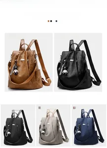 Detailed grid of oxford and leather backpacks in multiple colors with bear charms