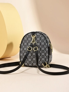 Fashionable retro print mini crossbody bag with black white pattern and gold hardware