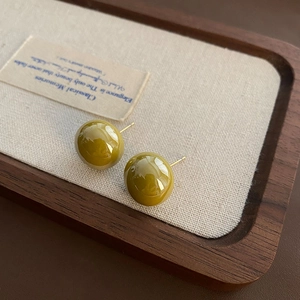 French retro olive green pearl earrings in titanium steel with high gloss finish