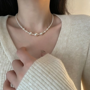 Elegant gradient pearl necklace in titanium steel featuring high-luster mermaid shells