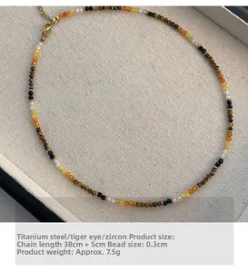 Detailed view of 38cm tiger eye stone beaded necklace with 5cm gold extension chain