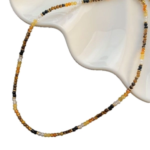 Tiger eye beaded necklace with faceted colorful stones and gold metal spacers