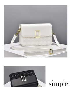 Detail of classic quilted crossbody bags with gold rectangle clasps in black and white