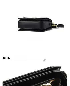 Detail view of the black quilted crossbody bag bottom and accordion-style compartments
