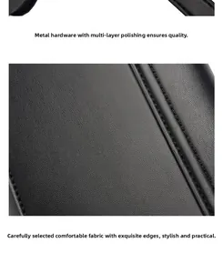 Detail of lychee pattern leather texture and polished metal hardware on a black bag