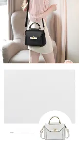 Detail of crossbody bag side weaving and gold handles in black and beige color