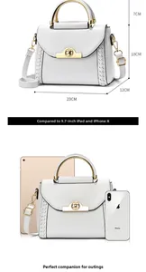 Size guide showing 23cm width white leather handbag compared with a 9.7 inch iPad