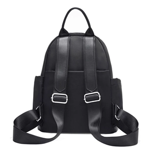 Sleek black minimalist backpack with adjustable straps and multiple storage pockets