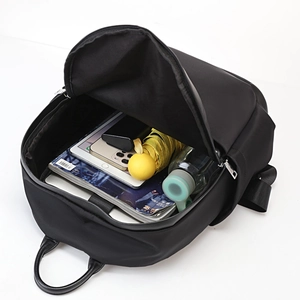 Black large capacity lightweight backpack showing spacious interior compartment and straps
