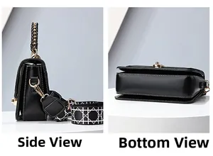 Detail view of black handbag showing side depth and bottom structure with golden hardware