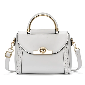 White leather handbag with gold metal handle and braided details, stylish crossbody bag