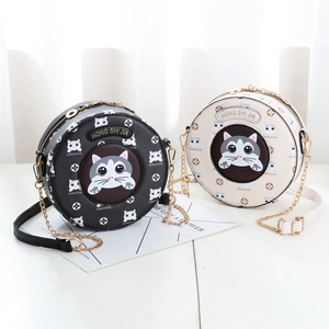 Cartoon cat themed round crossbody bag in black and cream white with gold chain strap
