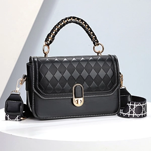 Elegant black quilted leather handbag with gold twist lock and woven chain handle