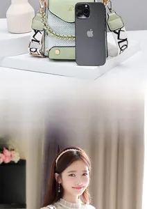 Mini mint green crossbody bag with chain handle and wide strap compared to iPhone size