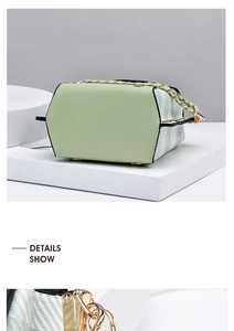 Detail of light green bag with golden metal feet and hexagon shape side profile