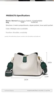 Detail view of cream bucket bag showing internal pockets and daily storage capacity