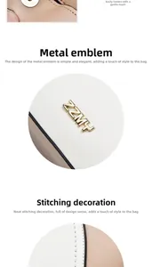 Detailed macro view of cream and brown leather bag with gold ZZMY logo and stitching