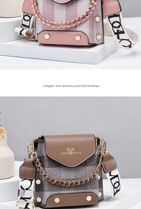 Detail of plaid crossbody bag featuring gold studs, chain handle, and lettered wide strap