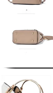 Detail view of khaki contrast tote bag showing gold bottom rivets and metal ring handle