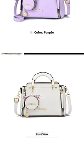 Vertical view of sweet cat-shaped charm on purple and white leather handbags