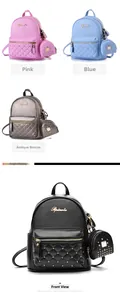 Close-up of mini quilted leather backpacks with gold rivets and matching coin purses