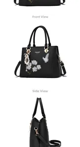 Details der Blumen-Stickerei und Perlen-Schleifen-Anhänger an schwarzer Handtasche