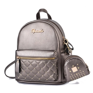 Metallic bronze mini backpack with quilted pocket, gold rivets and matching coin purse