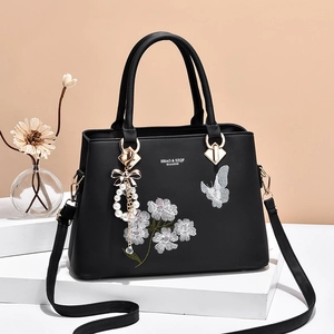 Elegante schwarze Handtasche mit Stickerei Perlenanhänger und Blumenmuster für Damen