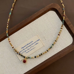 Handmade natural stone beaded necklace with a red zircon pendant in 18K gold plated steel